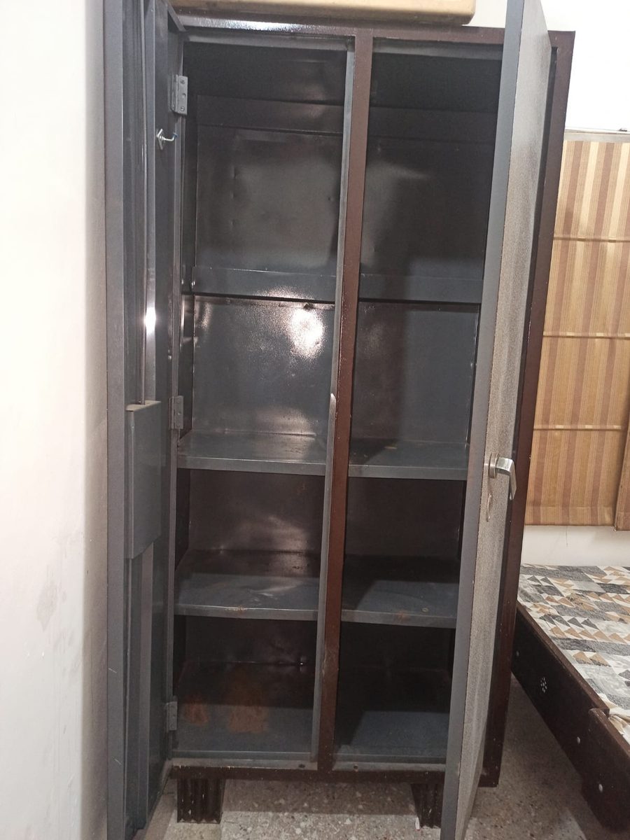 Almirah interior — spacious shelving